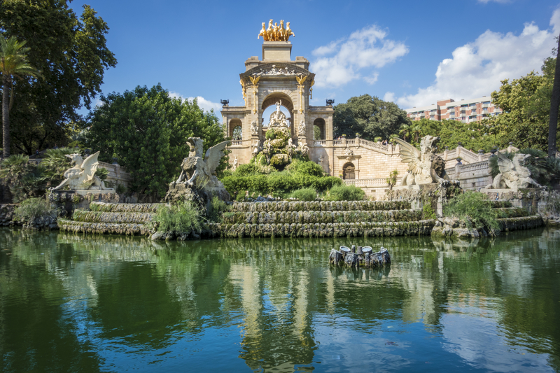 Barcelona park with pond and monument